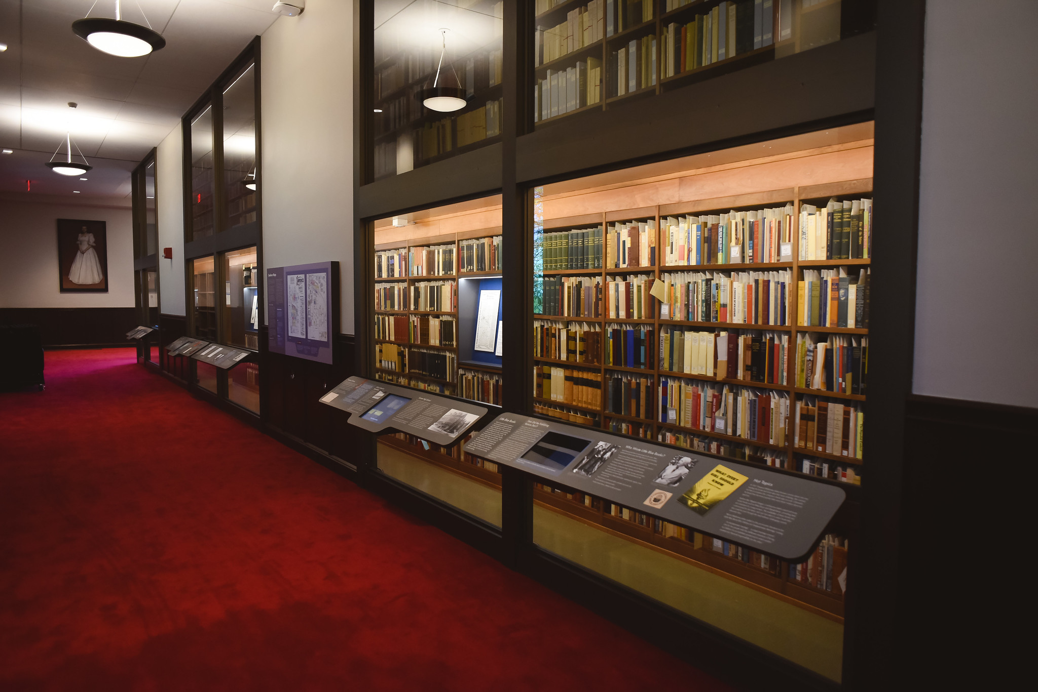 Interior of Spencer Research Library featuring red carpet and closed stacks