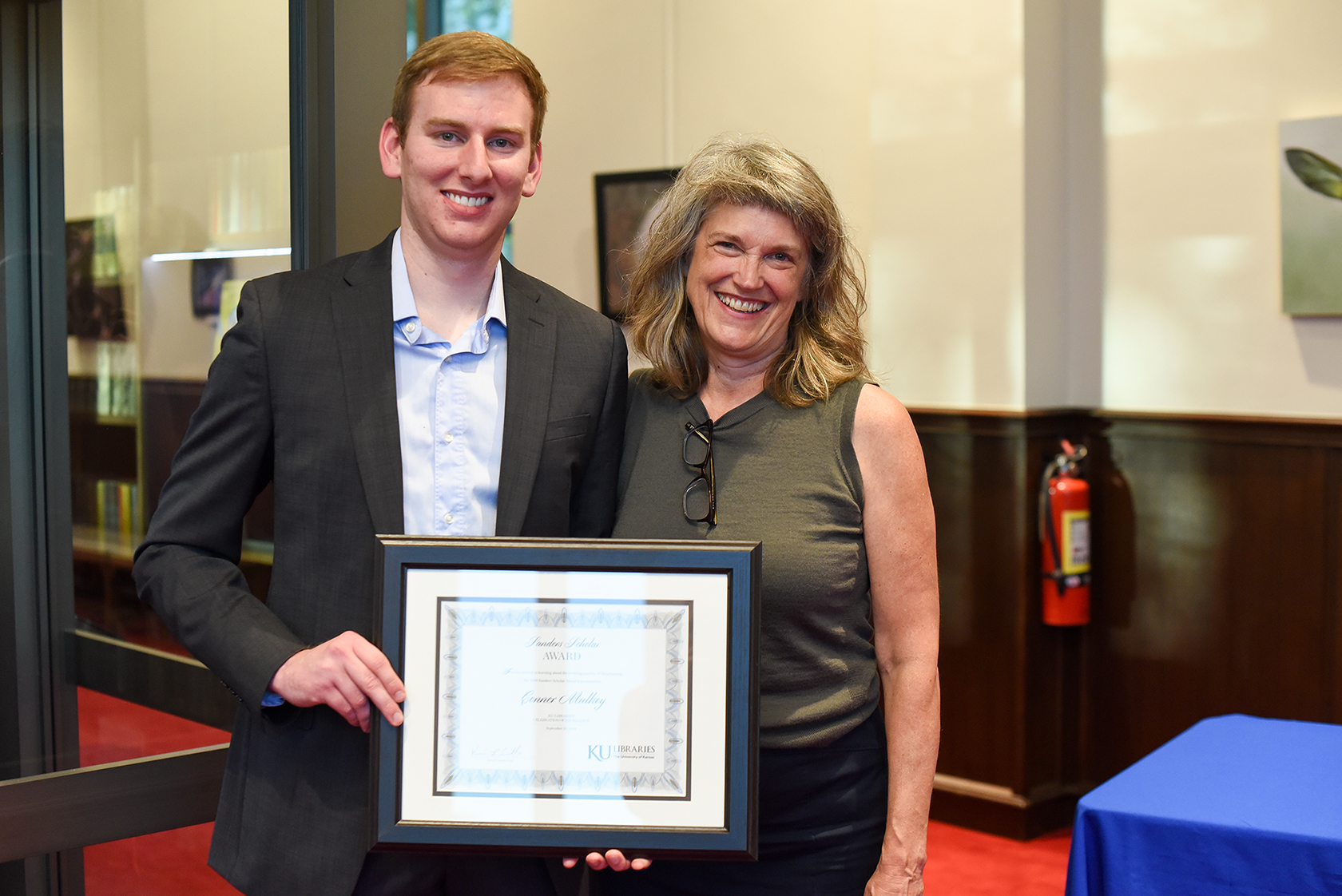 Student accepting award