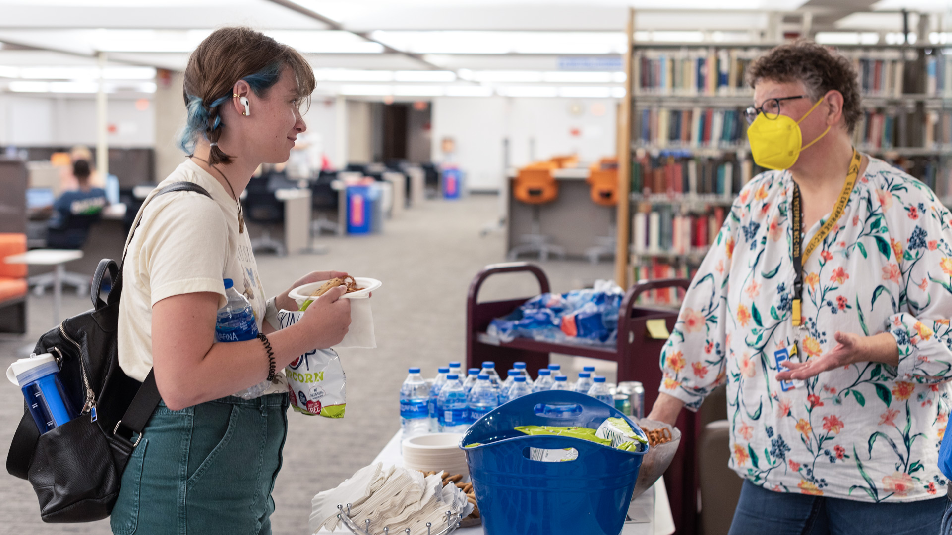 Marianne Reed speaks with a student during last year's Makerspace Open House.